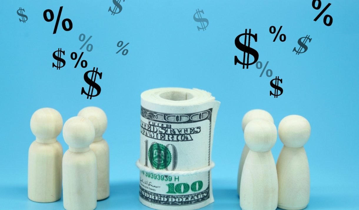 Wooden Figure With Profit Icon Investment Concept YK9J6HB Scaled 1 1220x715