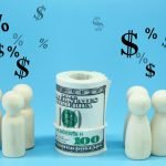 Wooden Figure With Profit Icon Investment Concept YK9J6HB Scaled 1 150x150