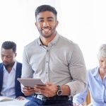 shot of a confident young businessman working in a modern office.